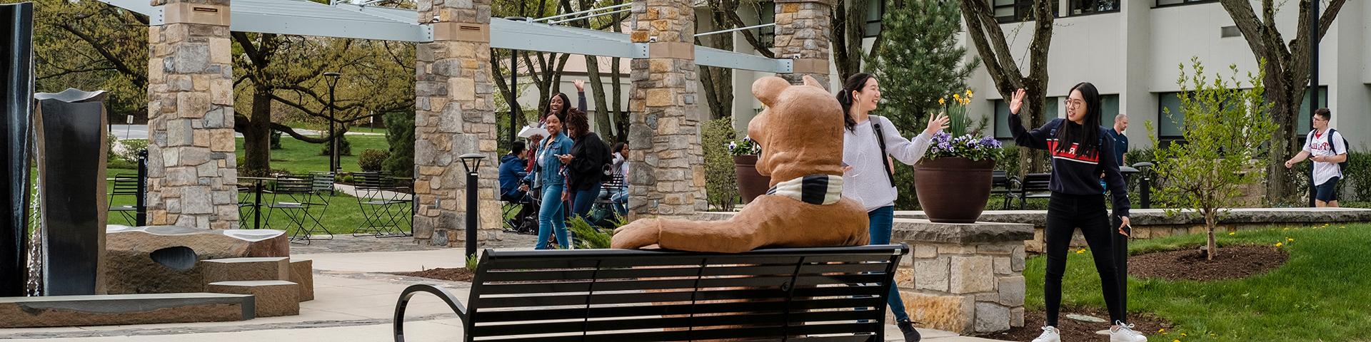 Students in the Plaza by the Lion Bench